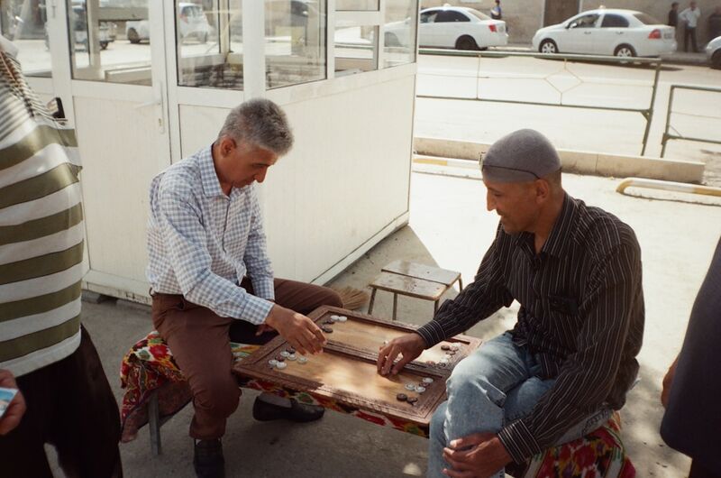ESL icebreaker games with students playing interactive board activities