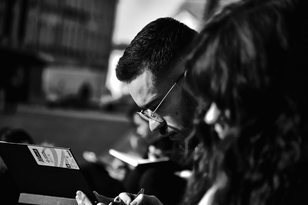 Students reading leveled texts in library for differentiated ESL instruction