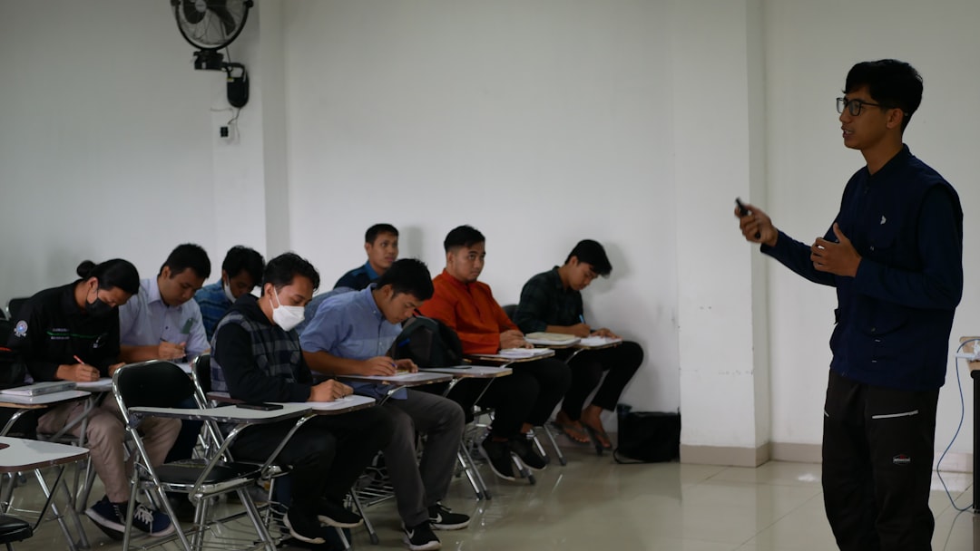Teacher leading an ESL speaking lesson with engaged students