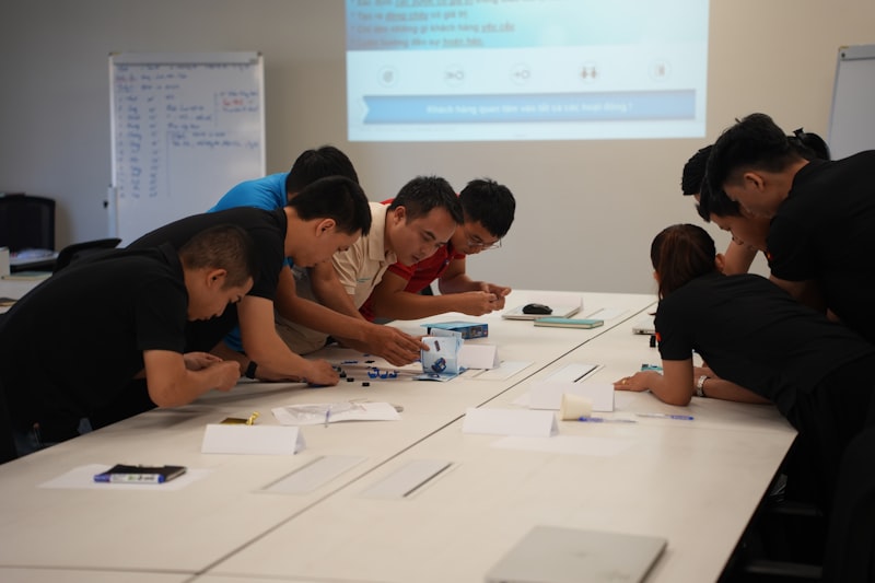 Team collaborating on task based project in educational setting