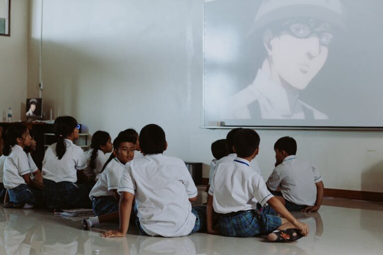 Students watching a movie in English language classroom for learning