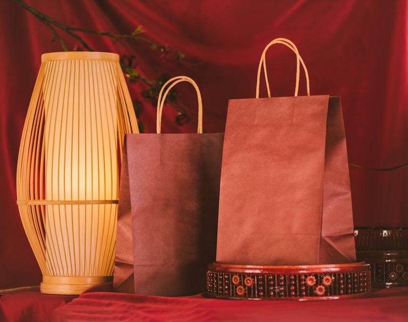 Shopping retail bags illustrating expressions like cost an arm and a leg
