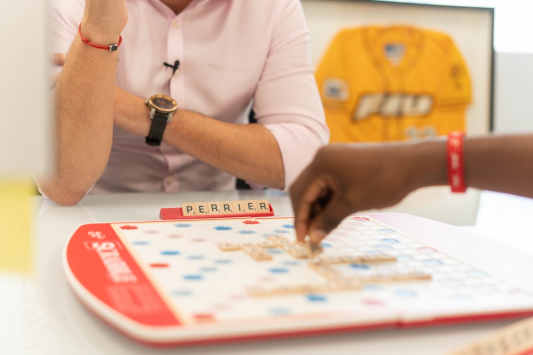 woman in white long sleeve shirt playing chess