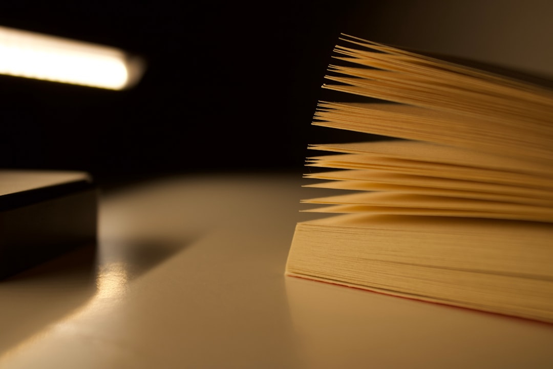 Close-up of an open book with yellowed pages.