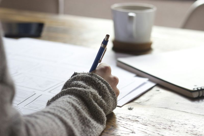 Student writing using Bloom's taxonomy action verbs
