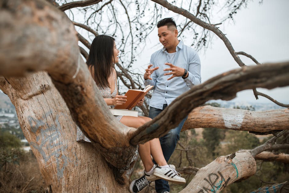 Intermediate English students in pair conversation