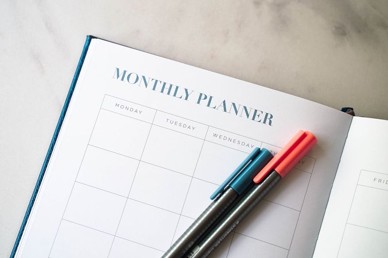 ESL lesson planning objectives written in a teacher's planner