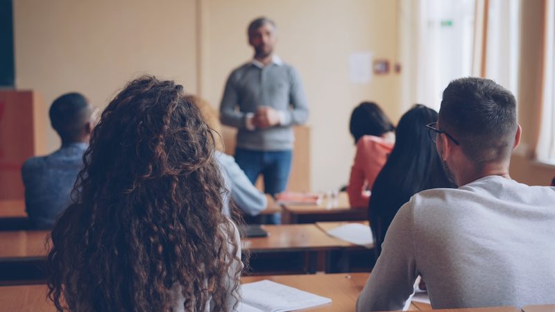 ESL teacher giving clear instructions to students