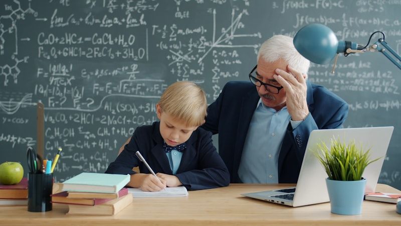 Teacher giving one-on-one help in a flipped classroom as a guide on the side