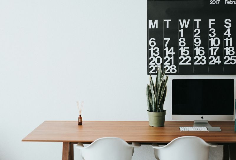 Desk and planner for revised Bloom's taxonomy lesson planning