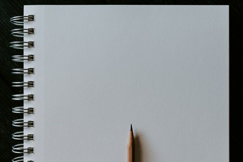 Blank notebook and pencil ready for a student to write an exit ticket response