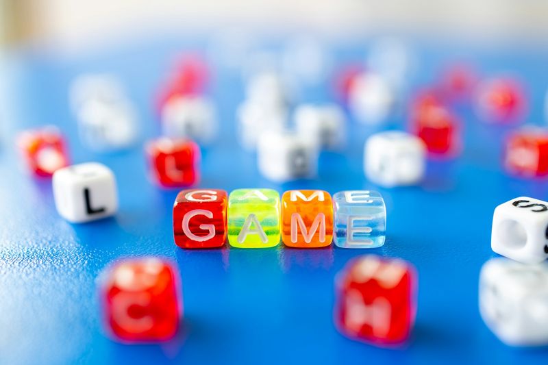 Colorful letter dice for ESL points and leaderboard game activities