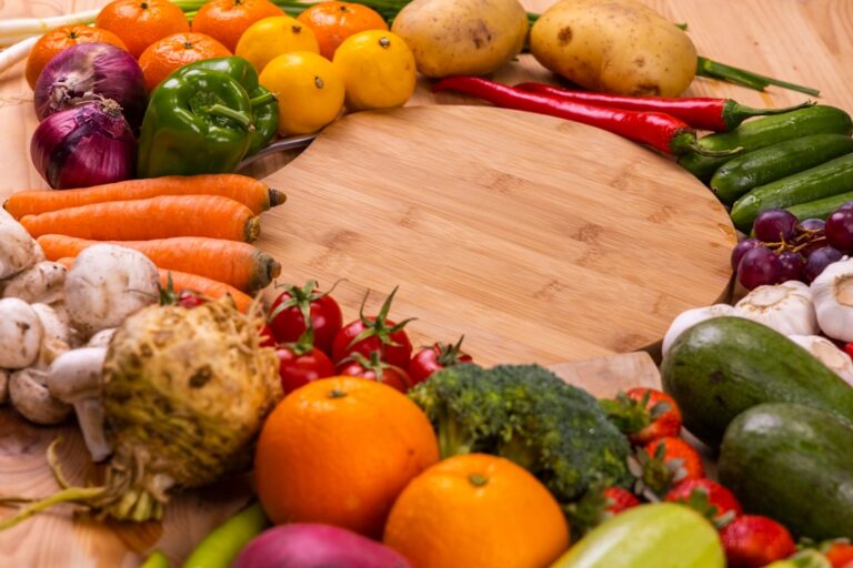 A colourful spread of fresh food ingredients on a wooden board