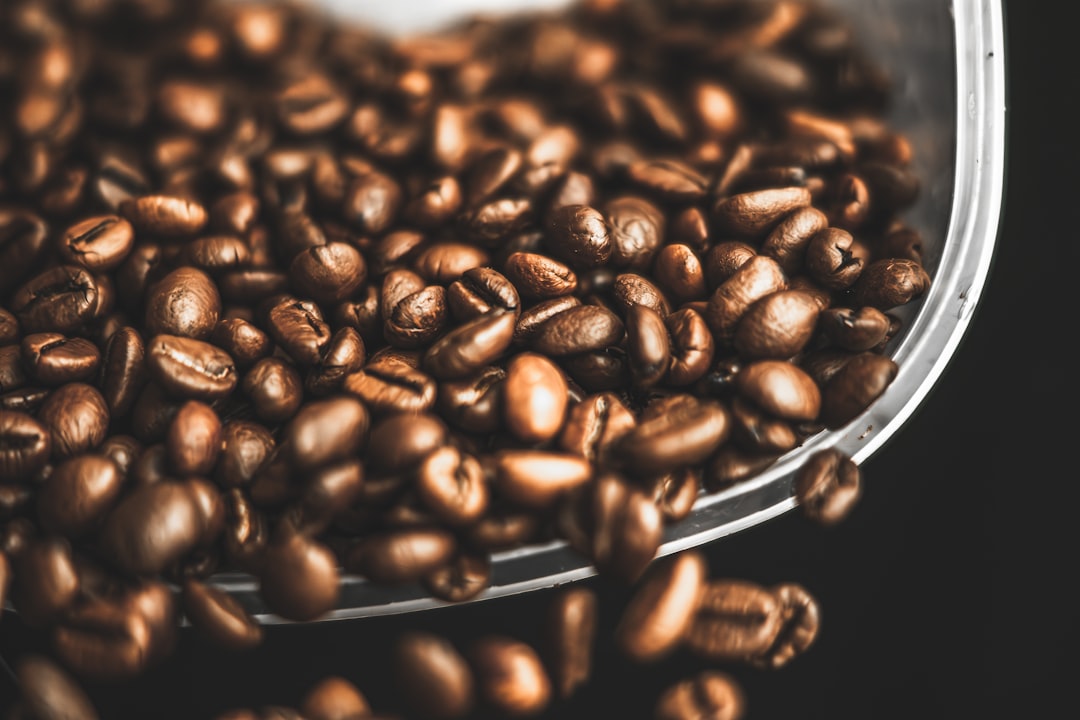 Coffee beans spilling out — spilling the beans