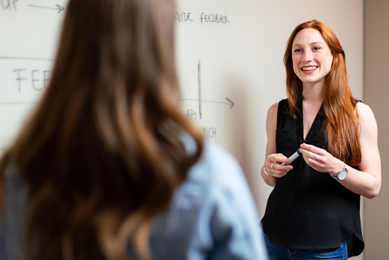Teacher giving positive feedback to ESL student