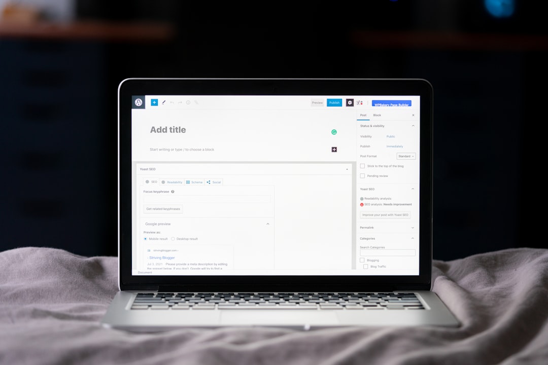 WordPress add a new post screen, with a laptop on the bed.