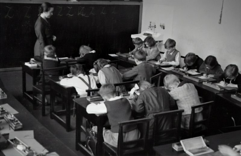 ESL dictation exercises students writing in classroom