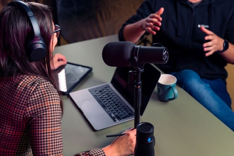 ESL homework assignment — listening to English podcast with headphones