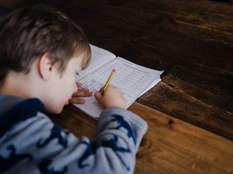 ESL homework ideas — student studying English at desk