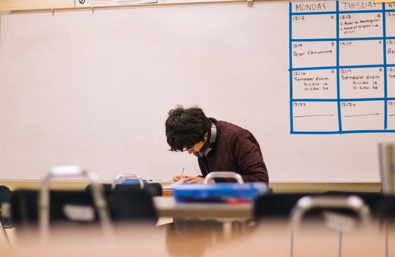 ESL teacher demonstrating think-aloud reading strategy in the classroom