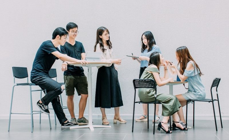 students in English debate class — structured speaking activity
