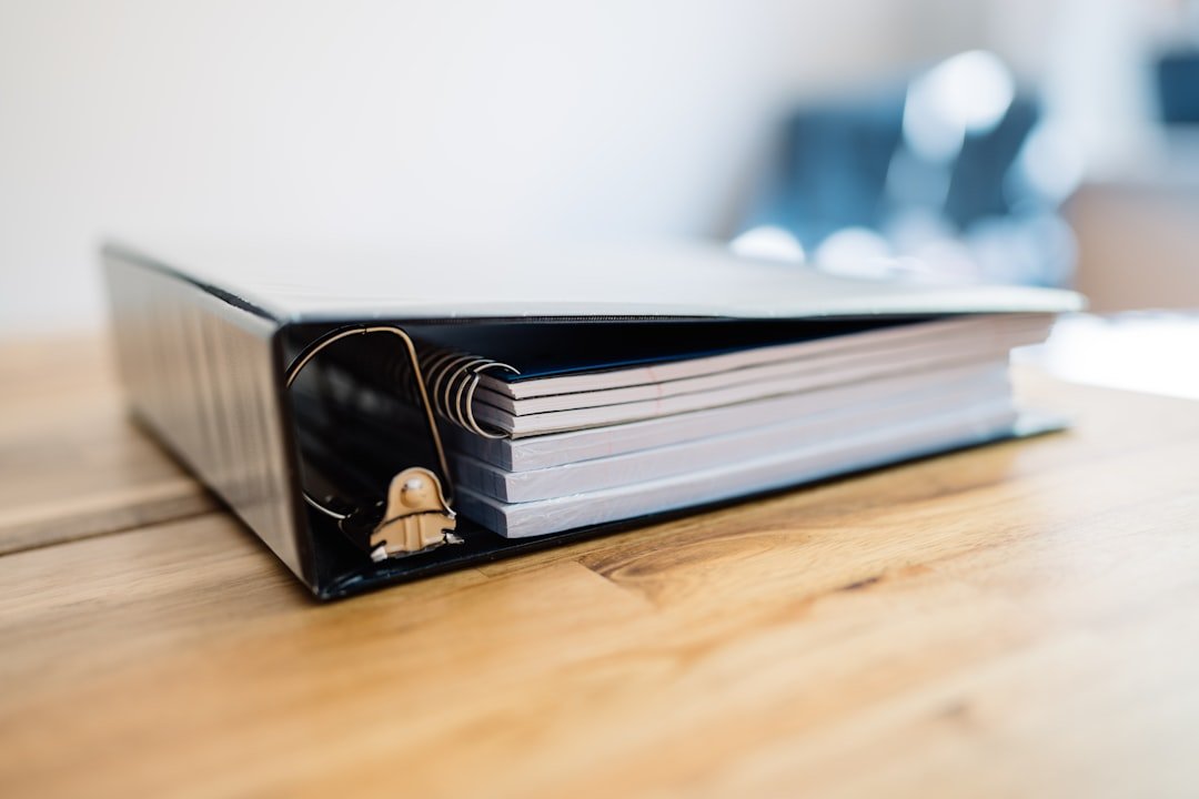 Binder with notebook and paper inside