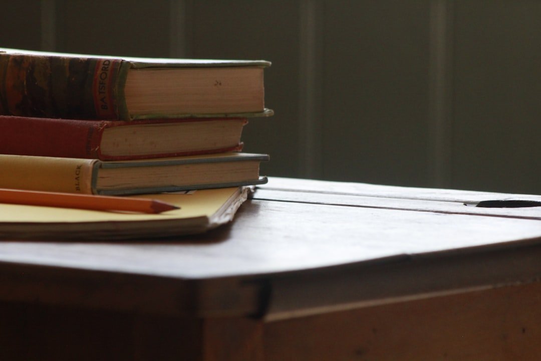 Vintage books on old school desk