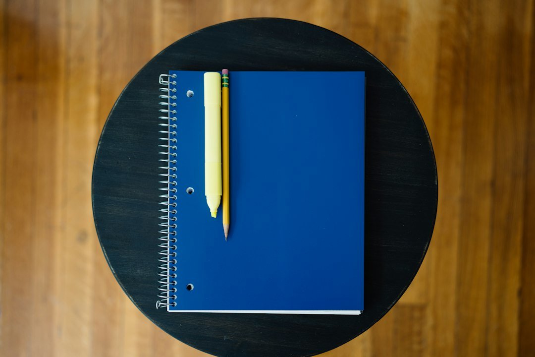 notebook with a pencil and eraser on it