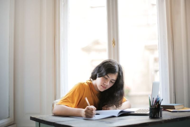 student essay draft with teacher corrections