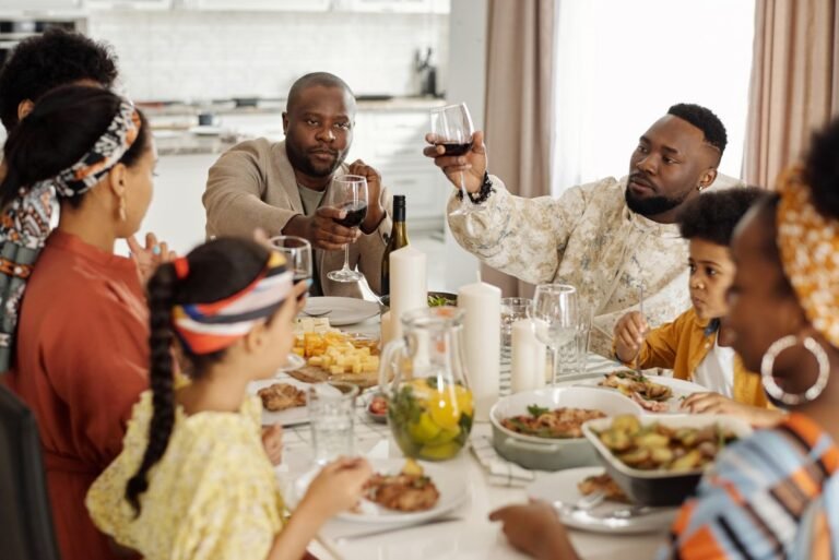 Big family gathered around the dinner table illustrating English family idioms