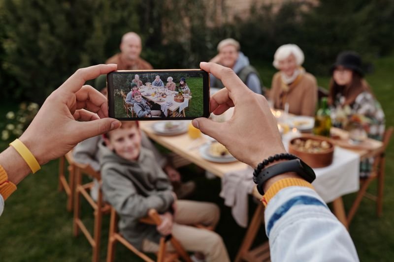 Extended family reunion outdoors illustrating close-knit family expression
