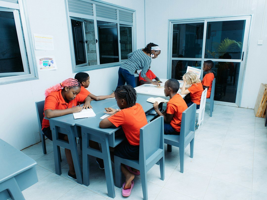 teenagers playing a review board game in ESL class