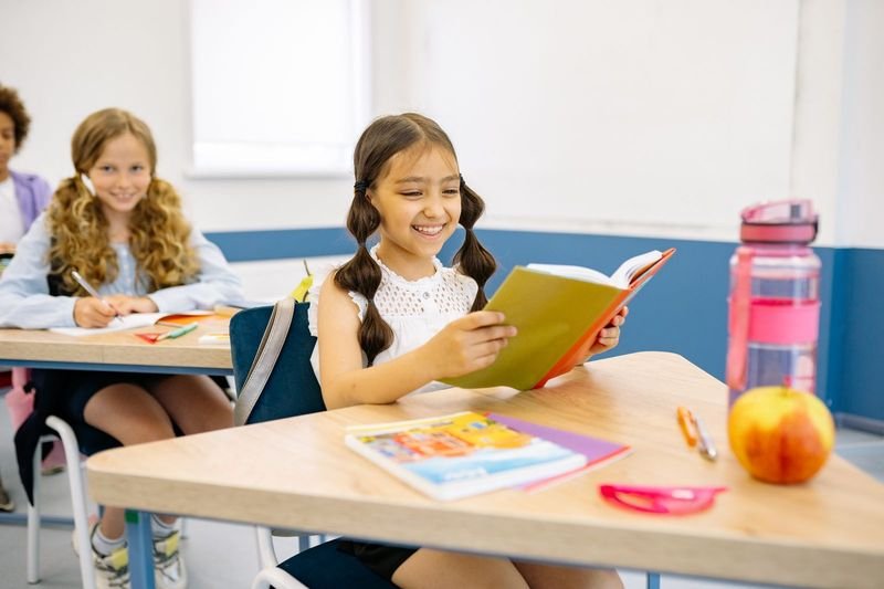 Teacher selecting a leveled reader's theatre script for an ESL classroom