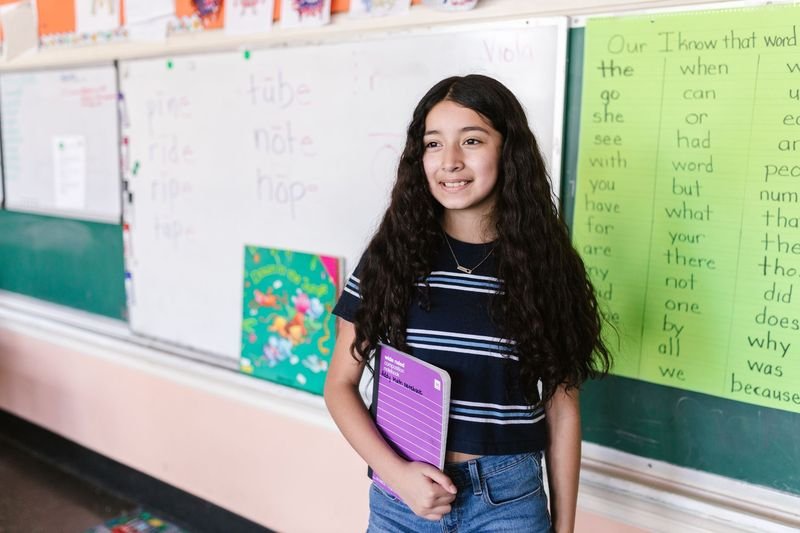 ESL student practicing mixed English exercises in a notebook
