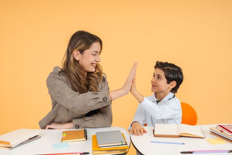 Teacher encouraging an anxious language learner one on one