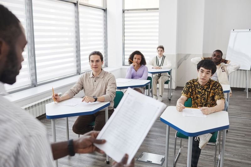 Teacher leading a minimal pairs pronunciation drill in ESL class