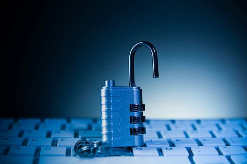 laptop keyboard with a padlock representing ClassDojo data privacy for international schools