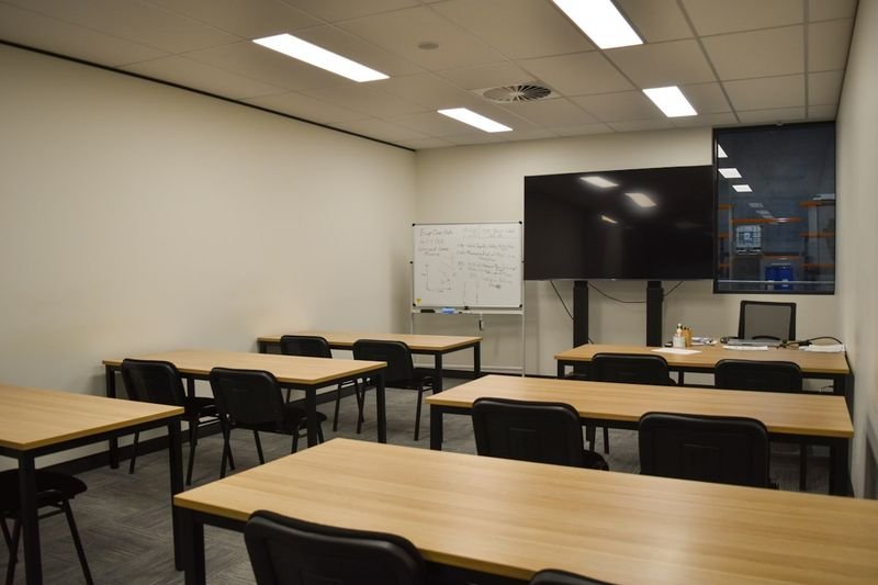 Classroom set up with a large digital screen for an interactive Nearpod lesson