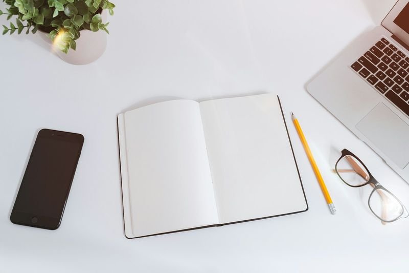 Open notebook and laptop used to draft an ESA method lesson plan