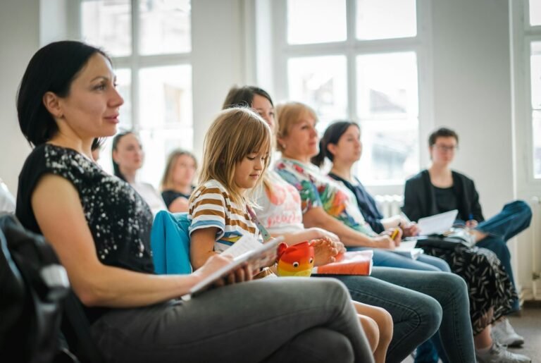 ESL parent and teacher communicating during a parent-teacher conference
