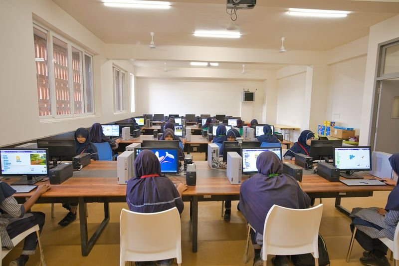 ESL students using classroom technology in a computer lab