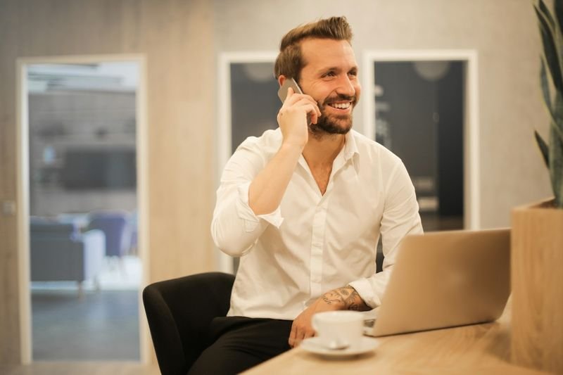ESL teacher making a positive phone call home to a parent