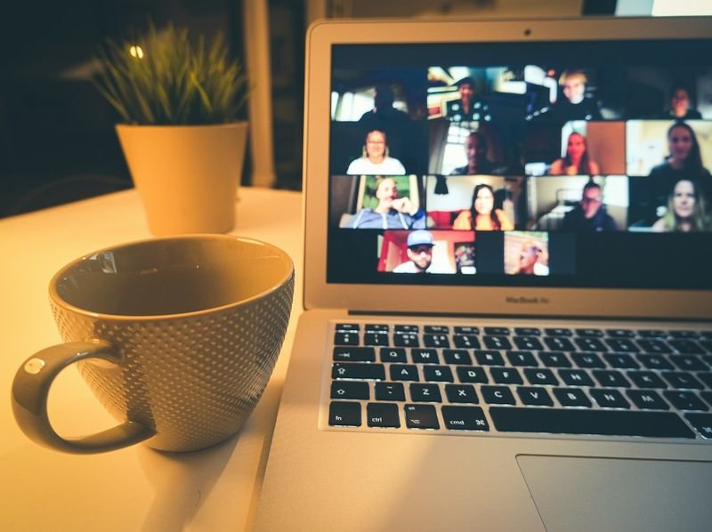 Virtual parent-teacher conference for ESL families using a laptop