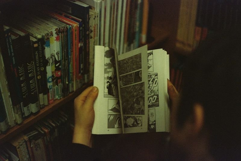 Gifted ESL student reading an advanced book above grade level