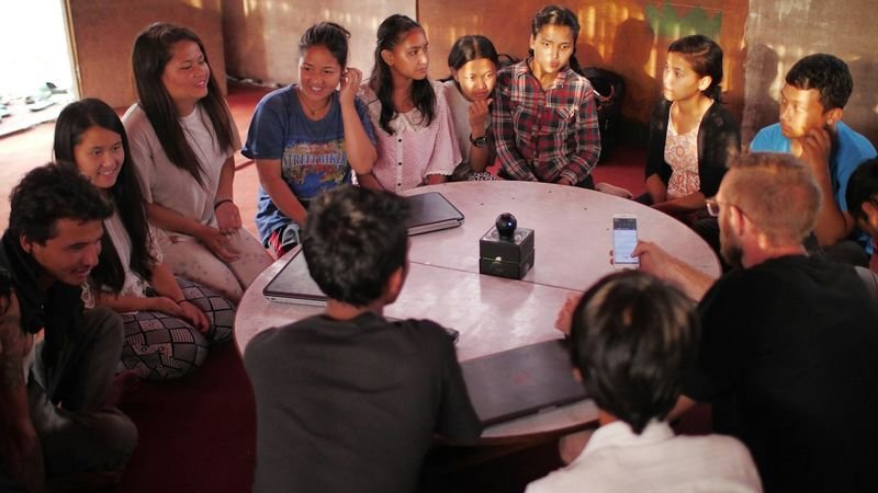 ESL students in a group discussion circle practicing translanguaging