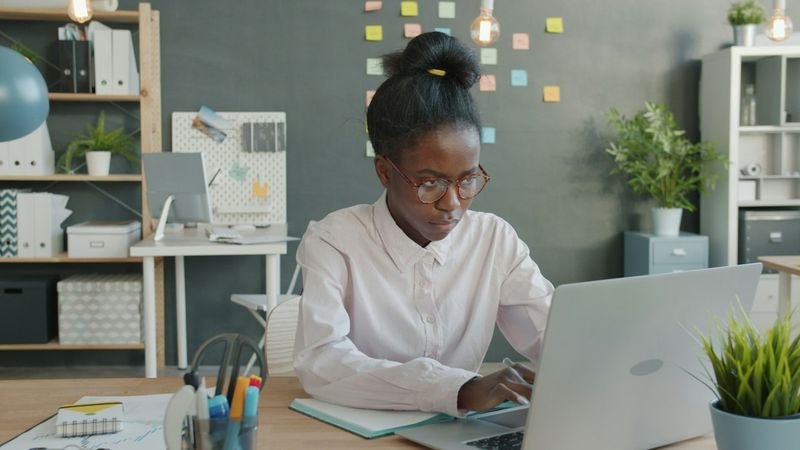 ESL teacher setting up a first Wordwall activity on a laptop